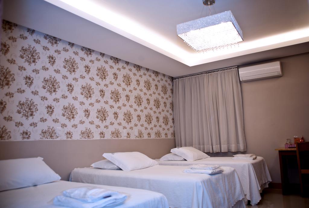 Quarto Triplo Executivo